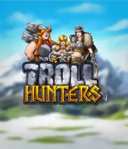 Изображение игрового автомата "Troll Hunters" от Play'N Go, на котором представлены три викинга: две женщины и один мужчина, одетые в традиционные викингские доспехи. На фоне виднеются горные вершины, что добавляет атмосферу скандинавской мифологии. Этот слот идеален для поклонников викингских саг и поисков приключений.